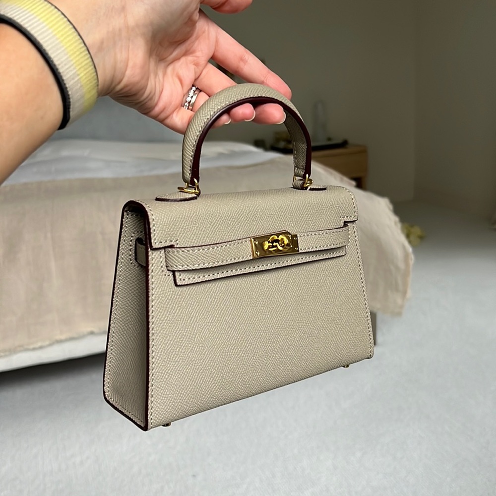 Mini crossbody top handle bag